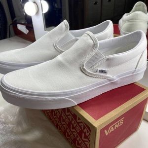 New In Box- white slip on Vans Men’s 8/Womens 9.5